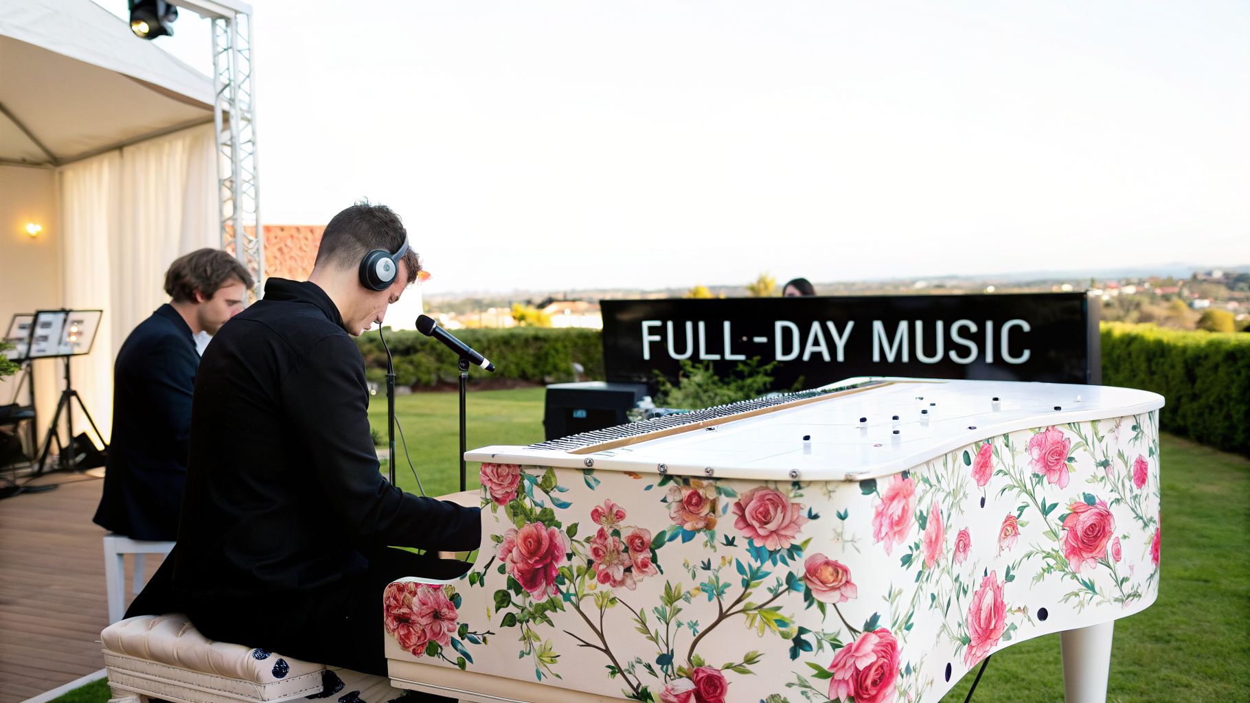 Two male pianists perform outdoors with a floral piano and a 'FULL-DAY MUSIC' banner.